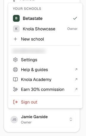 The account menu open at the bottom of the sidebar: Your schools with two schools and New school, then Settings, Help & guides, Knola Academy and Sign out